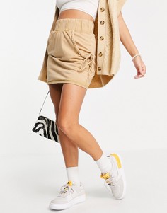 Трикотажная мини-юбка светло-бежевого цвета с рюшами на карманах ASOS DESIGN-Многоцветный