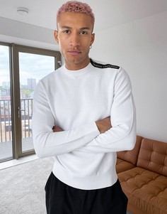 Белый джемпер с фирменной тесьмой на плече Armani Exchange