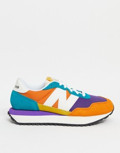 Оранжевые кроссовки в стиле колор блок New Balance 237-Оранжевый цвет
