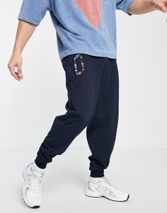 Зауженные джоггеры с аппликацией от комплекта ASOS DESIGN-Белый