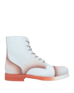 Полусапоги и высокие ботинки Santoni