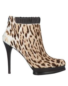 Полусапоги и высокие ботинки Stuart Weitzman