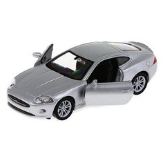 Детская игрушечная коллекционная металическая модель машинки игрушки Kinsmart "Ягуар XK купе" (металлическая, инерционная) серый 1:38