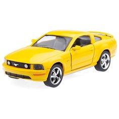 Детская игрушечная коллекционная металическая модель машинки игрушки Kinsmart "Форд Mustang GT" (металлическая, инерционная) желтый 1:38