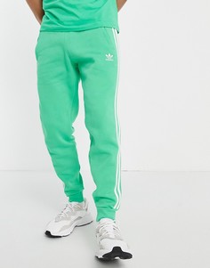 Зеленые джоггеры с тремя полосками adidas Originals adicolor-Зеленый цвет