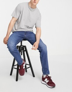 Суженные книзу джинсы голубого выбеленного оттенка средней интенсивности Levis 502-Голубой Levis®