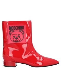 Полусапоги и высокие ботинки Moschino