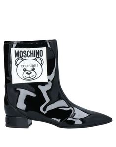 Полусапоги и высокие ботинки Moschino