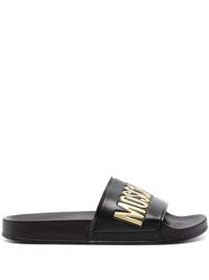 Moschino шлепанцы с тисненым логотипом