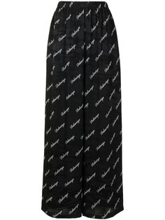 Balenciaga брюки с камуфляжным узором и логотипом