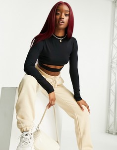 Черный кроп-топ с длинными рукавами и вырезом под грудью ASOS DESIGN