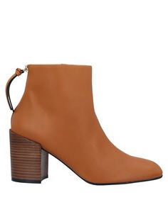 Полусапоги и высокие ботинки Stuart Weitzman