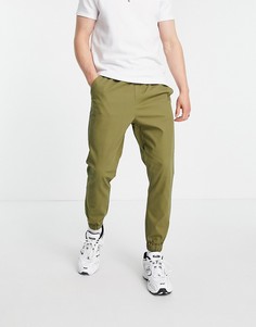 Суженные книзу брюки-чиносы цвета хаки с эластичным поясом ASOS DESIGN-Зеленый цвет