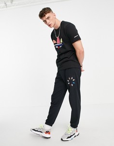 Черные джоггеры с акцентным деформированным логотипом-трилистником adidas Originals-Черный цвет