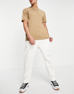 Вельветовые суженные книзу брюки белого цвета Carhartt WIP-Белый