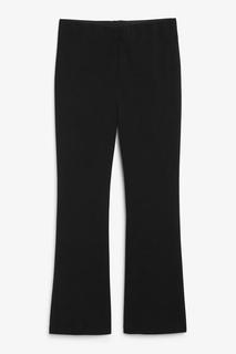 Укороченные расклешенные брюки Monki