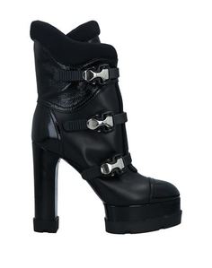 Полусапоги и высокие ботинки Casadei