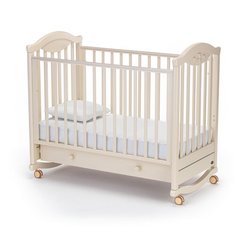 Кроватка Nuovita Lusso (колесо) (качалка), на полозьях слоновая кость