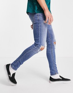 Синие выбеленные джинсы с покрытием из эластичной ткани и рваной отделкой ASOS DESIGN-Голубой