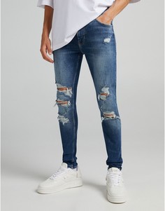 Синие супероблегающие джинсы с рваной отделкой и необработанными краями Bershka-Голубой