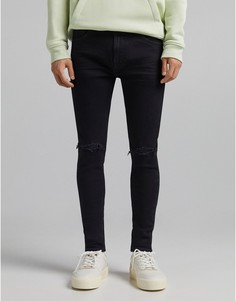 Черные выбеленные супероблегающие джинсы с прорехами Bershka-Черный цвет
