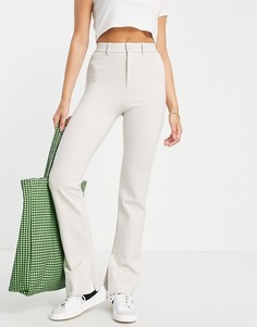 Расклешенные брюки с разрезами цвета экрю Stradivarius-Белый