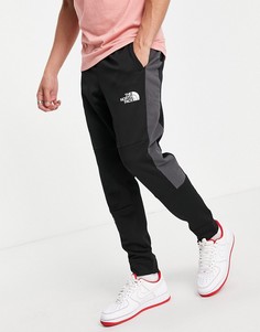 Черные джоггеры с манжетами The North Face Mountain Athletic-Черный цвет