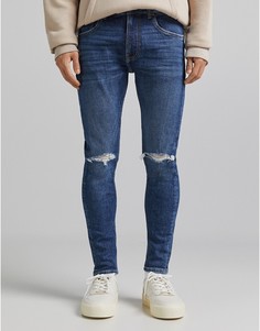 Синие супероблегающие джинсы с рваной отделкой Bershka-Голубой