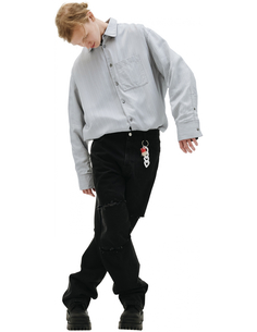 Джинсы с разрезами на коленях RAF Simons