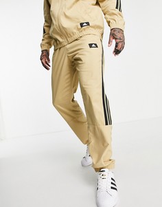 Бежевые тканые джоггеры с тремя полосками adidas-Светло-бежевый цвет