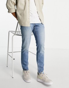 Узкие джинсы грязно-синего цвета ASOS DESIGN-Голубой
