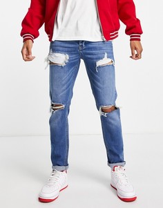 Эластичные узкие джинсы со рваной отделкой темно-синего выбеленного оттенка ASOS DESIGN-Голубой