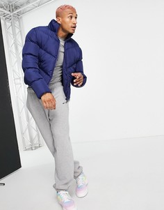Темно-синий пуховик из переработанных материалов ASOS DESIGN Recycled