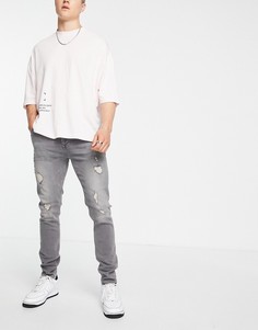 Серые зауженные джинсы с потертостями ASOS DESIGN-Серый