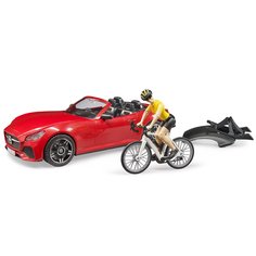Спортивный автомобиль Bruder Roadster с фигуркой и велосипедом 03-485