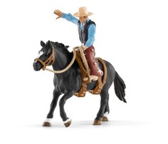 Фигурка Ковбой в седле на необъезженной лошади Schleich