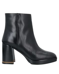 Полусапоги и высокие ботинки Tory Burch
