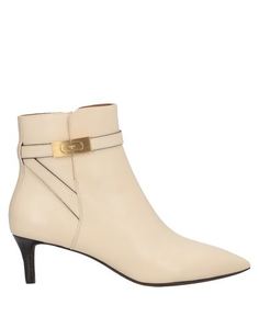 Полусапоги и высокие ботинки Tory Burch