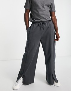 Черные выбеленные джоггеры в стиле oversized с широкими штанинами и разрезами спереди ASOS DESIGN-Черный цвет