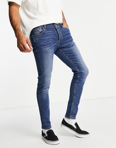 Темные выбеленные джинсы скинни из органического хлопка ASOS DESIGN-Голубой