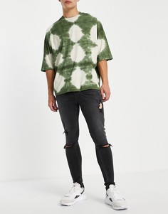 Черные выбеленные супероблегающие джинсы из плотного эластичного денима со рваной отделкой ASOS DESIGN-Черный цвет