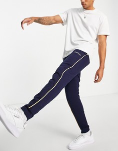 Темно-синие джоггеры с логотипом и отделкой кантом Reebok Classics-Темно-синий