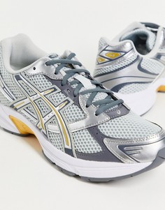 Серебристые кроссовки с золотистой отделкой Asics Gel-1130-Серебряный
