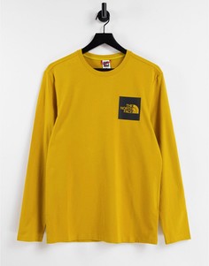 Желтый лонгслив The North Face