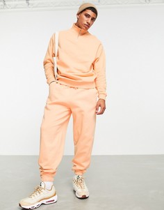 Оранжевые oversized-джоггеры от комплекта ASOS DESIGN-Оранжевый цвет