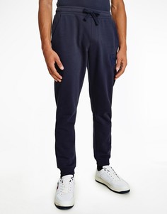 Темно-синие джоггеры с однотонным логотипом-флагом и манжетами Tommy Jeans-Темно-синий
