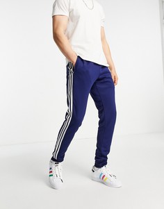 Темно-синие джоггеры с тремя полосками adidas Originals adicolor-Темно-синий
