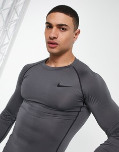 Серый лонгслив Nike Pro Training