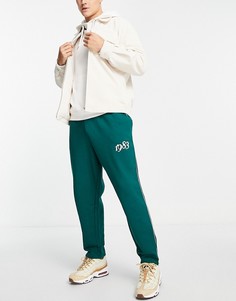 Джоггеры в стиле oversized зеленого цвета с окантовкой и текстовой вышивкой от комплекта ASOS DESIGN-Черный цвет