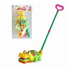 Каталка-сортер на палочке "Крокодил" Yako